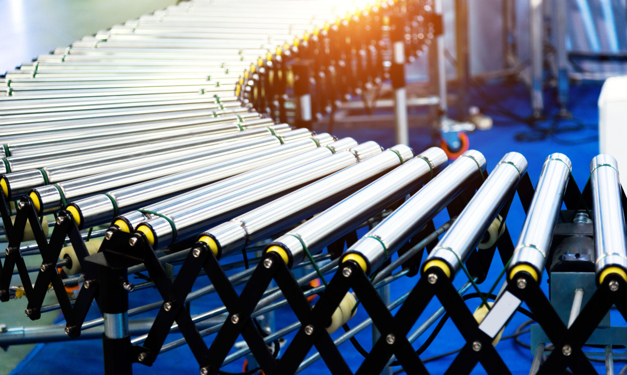 Empty roller conveyor belt in a factory